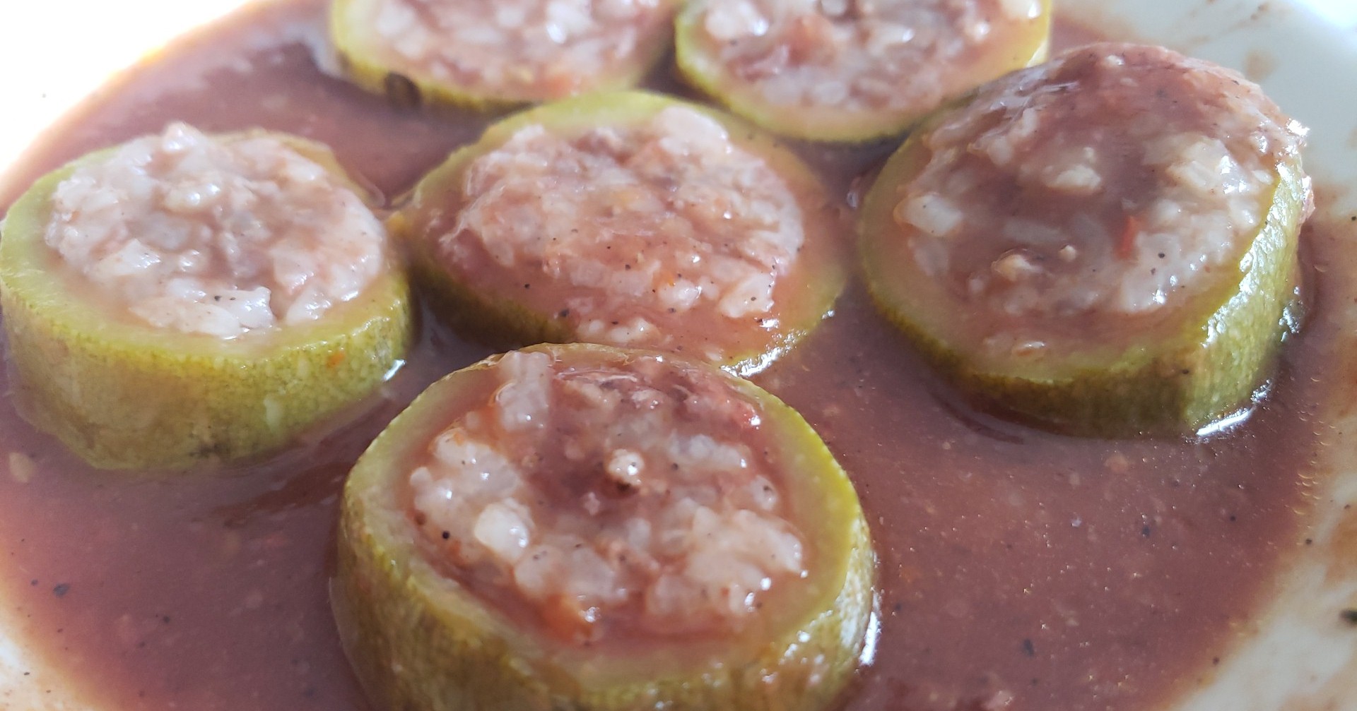 356 Stuffed Zucchini and Tomato Baked in our Famous Seasoned Tomato Sauce